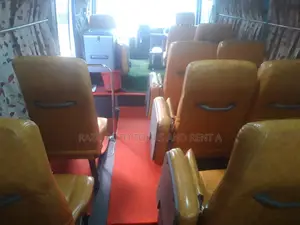 Nissan Coster Bus For Rent