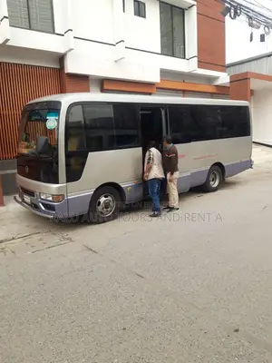 Nissan Coster Bus For Rent