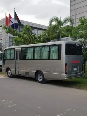 Nissan Coster Bus For Rent
