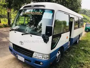 Nissan Coster Bus For Rent