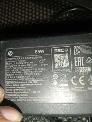 65 Watt HP Laptop Original Charger and A4 Tech Mouse