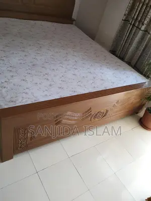 Malaysian Wood Bed with Carvings