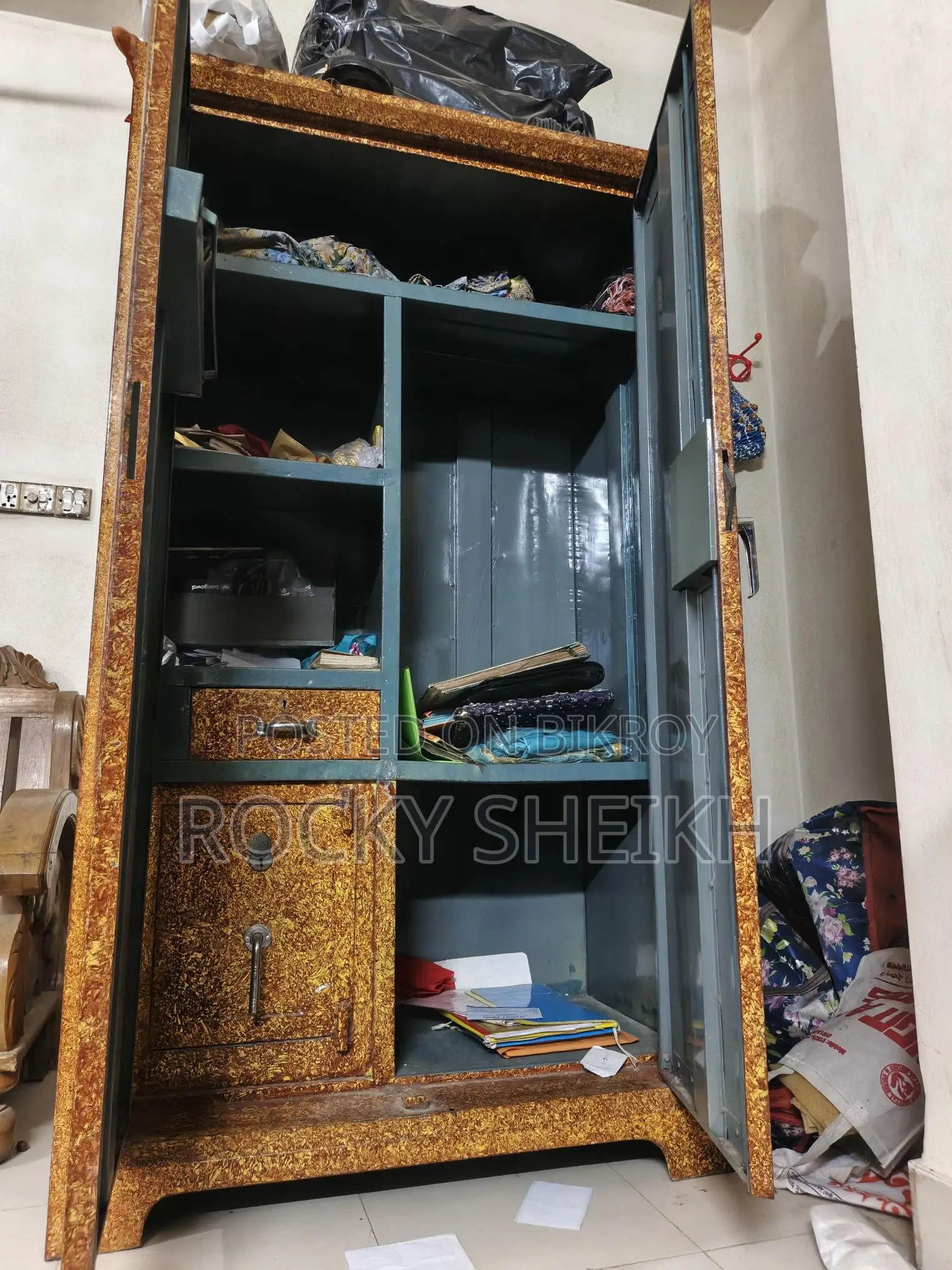 Steel cupboard with safe box