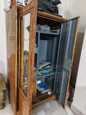 Steel cupboard with safe box