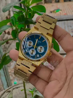 নতুন গোল্ডেন কালারের Tissot ঘড়ি