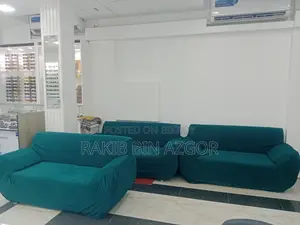 Used six-seater sofa and cover for sale.