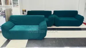 Used six-seater sofa and cover for sale.
