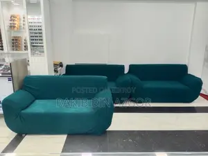 Used six-seater sofa and cover for sale.