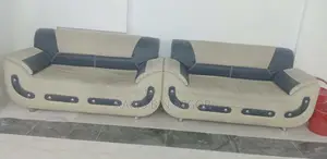 Used six-seater sofa and cover for sale.