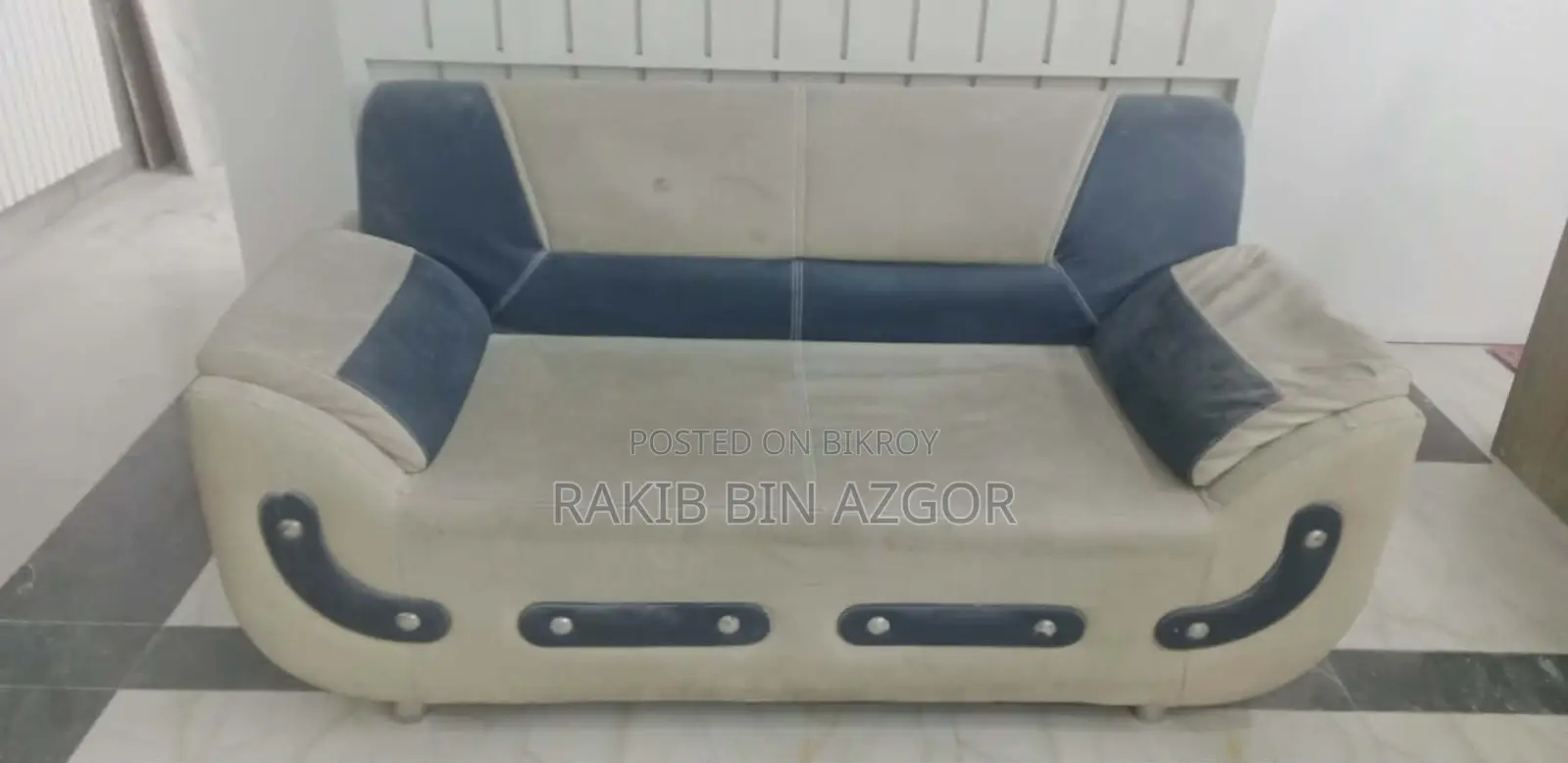 Used six-seater sofa and cover for sale.