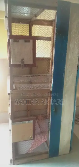 A two-cage pigeon coop for sale
