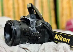 Nikon D3100 with 50mm prime lens ✅ সঙ্গে সবকিছু পাবেন