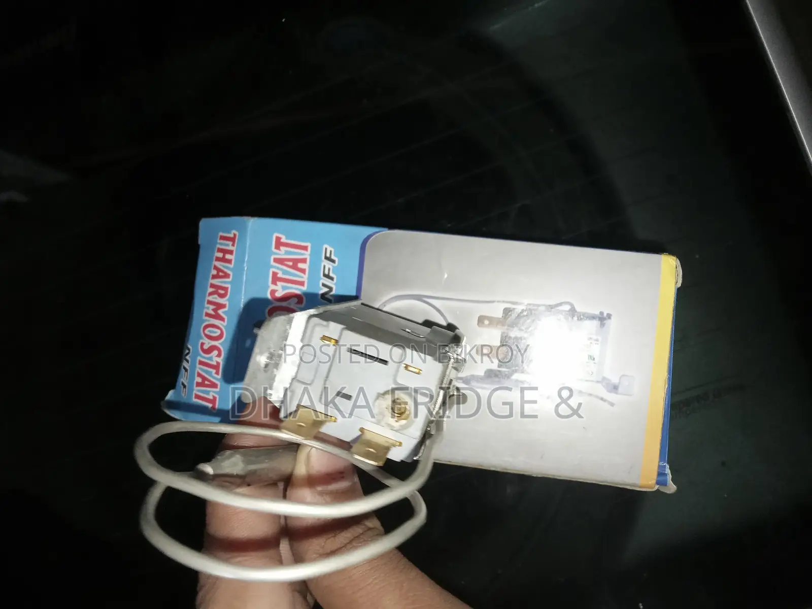 Refrigerator thermostat