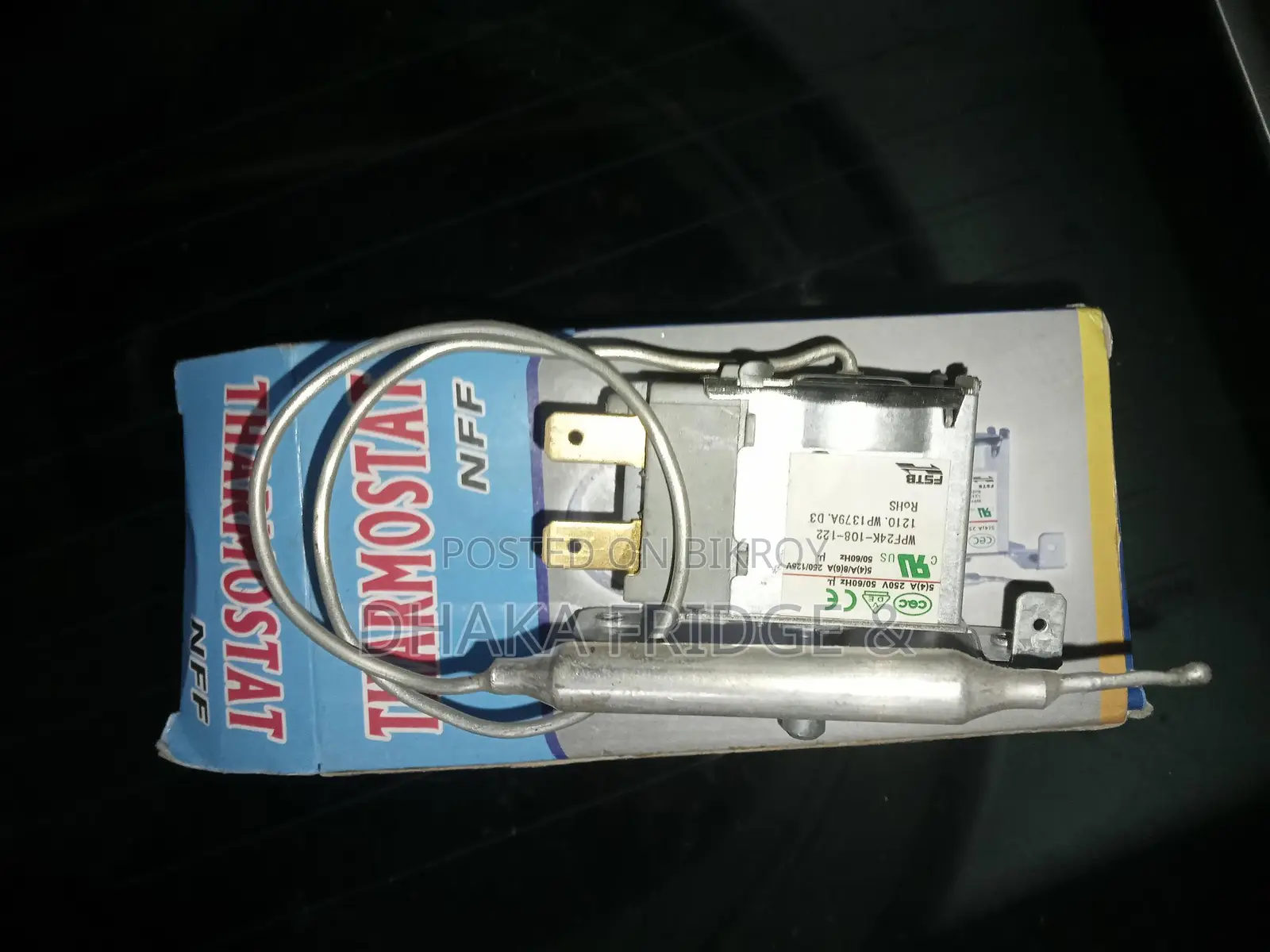 Refrigerator thermostat