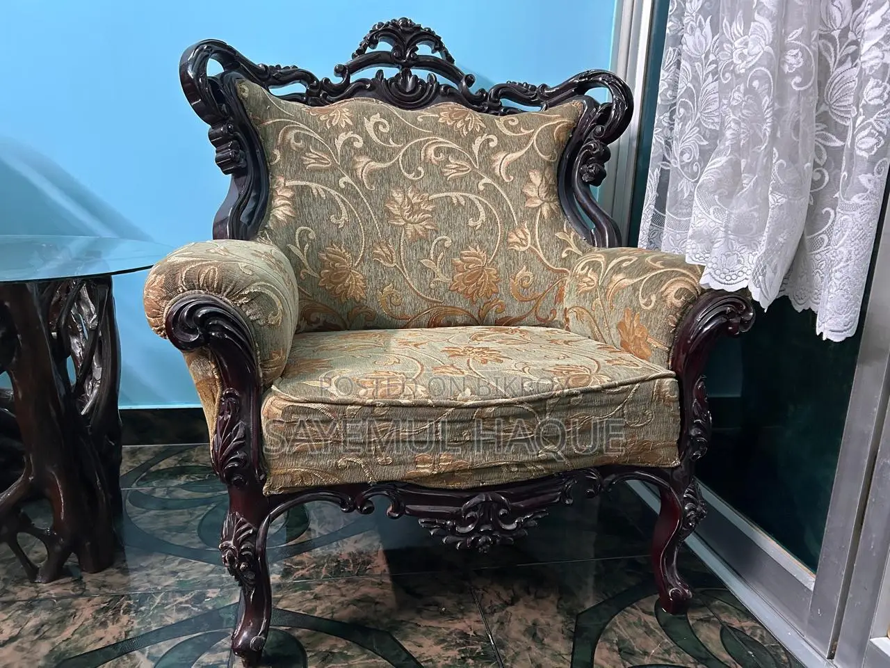 Teak wood sofa, divan set, and table.