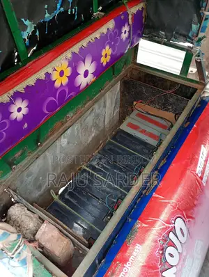 A Mishuk Auto Rickshaw for sale.