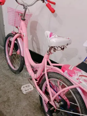 A small ladies' bicycle is for sale.