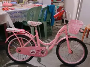 A small ladies' bicycle is for sale.