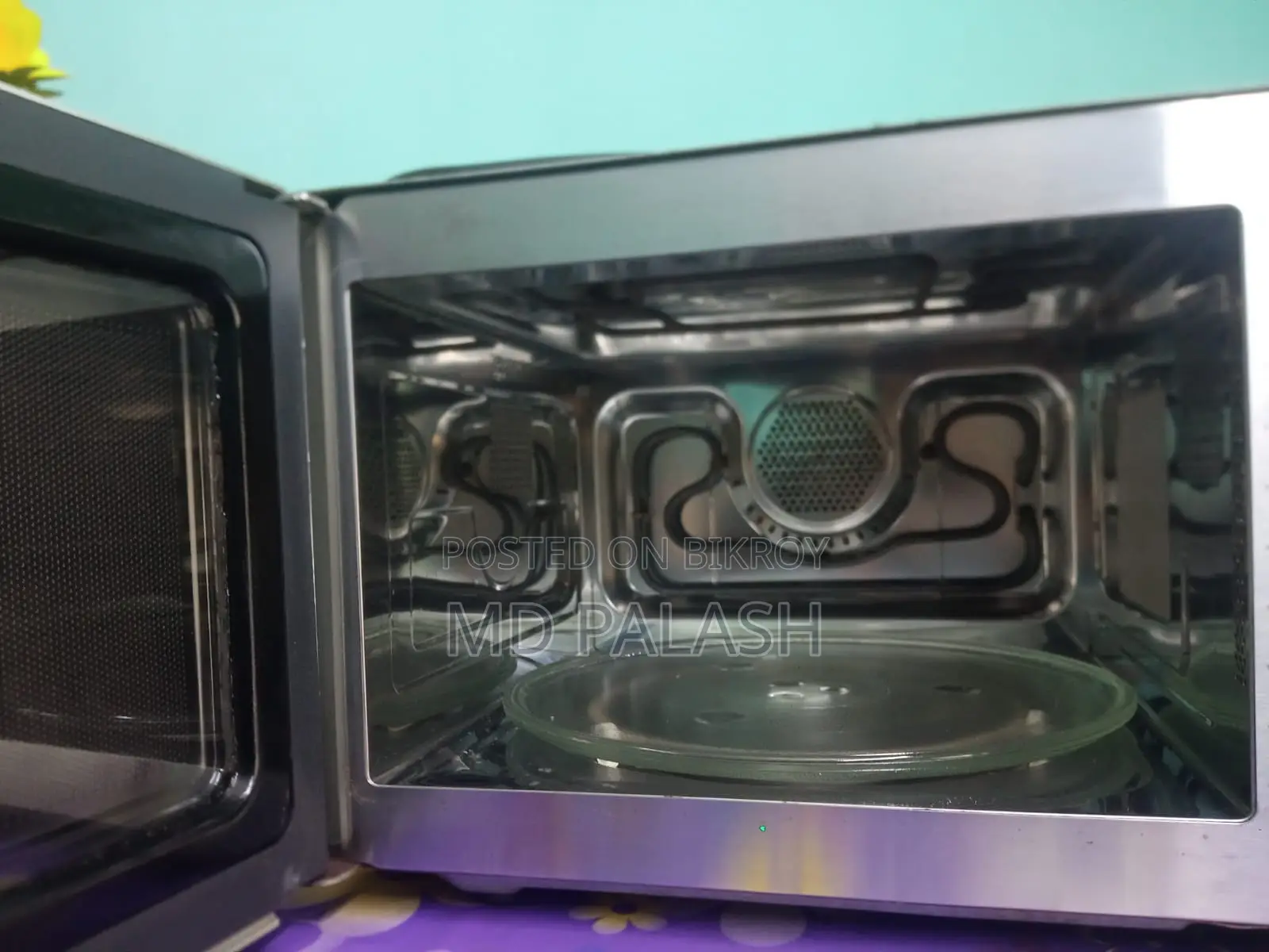 Whirlpool Magicook 25c মাইক্রো ওভেন।