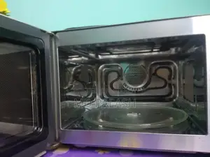 Whirlpool Magicook 25c মাইক্রো ওভেন।