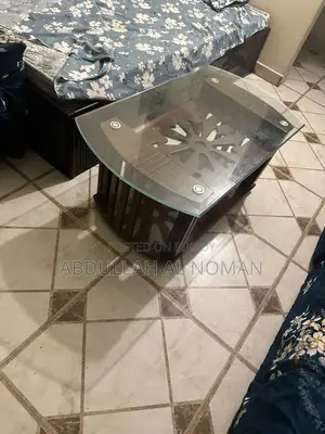 Modern Glass Top Center Table – Solid Wood Base (Used)