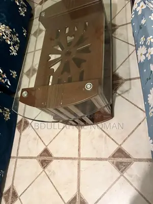 Modern Glass Top Center Table – Solid Wood Base (Used)