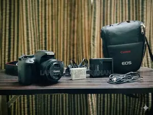 Canon EOS 550D DSLR + EF 50mm f/1.8 STM Lens