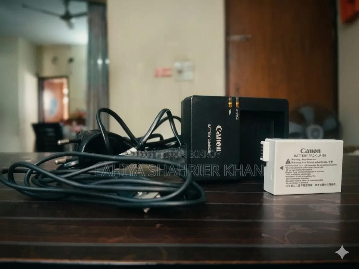 Canon EOS 550D DSLR + EF 50mm f/1.8 STM Lens