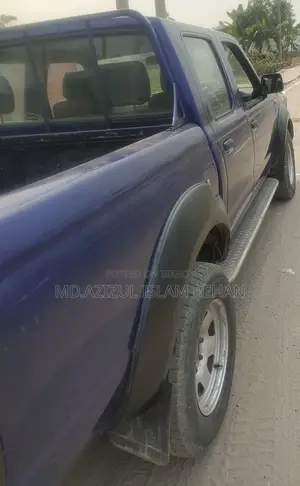 Nissan Carryboy . 2005