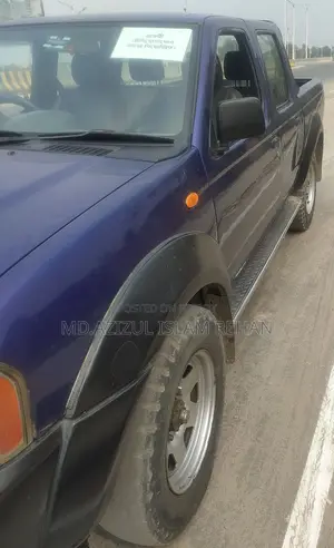Nissan Carryboy . 2005