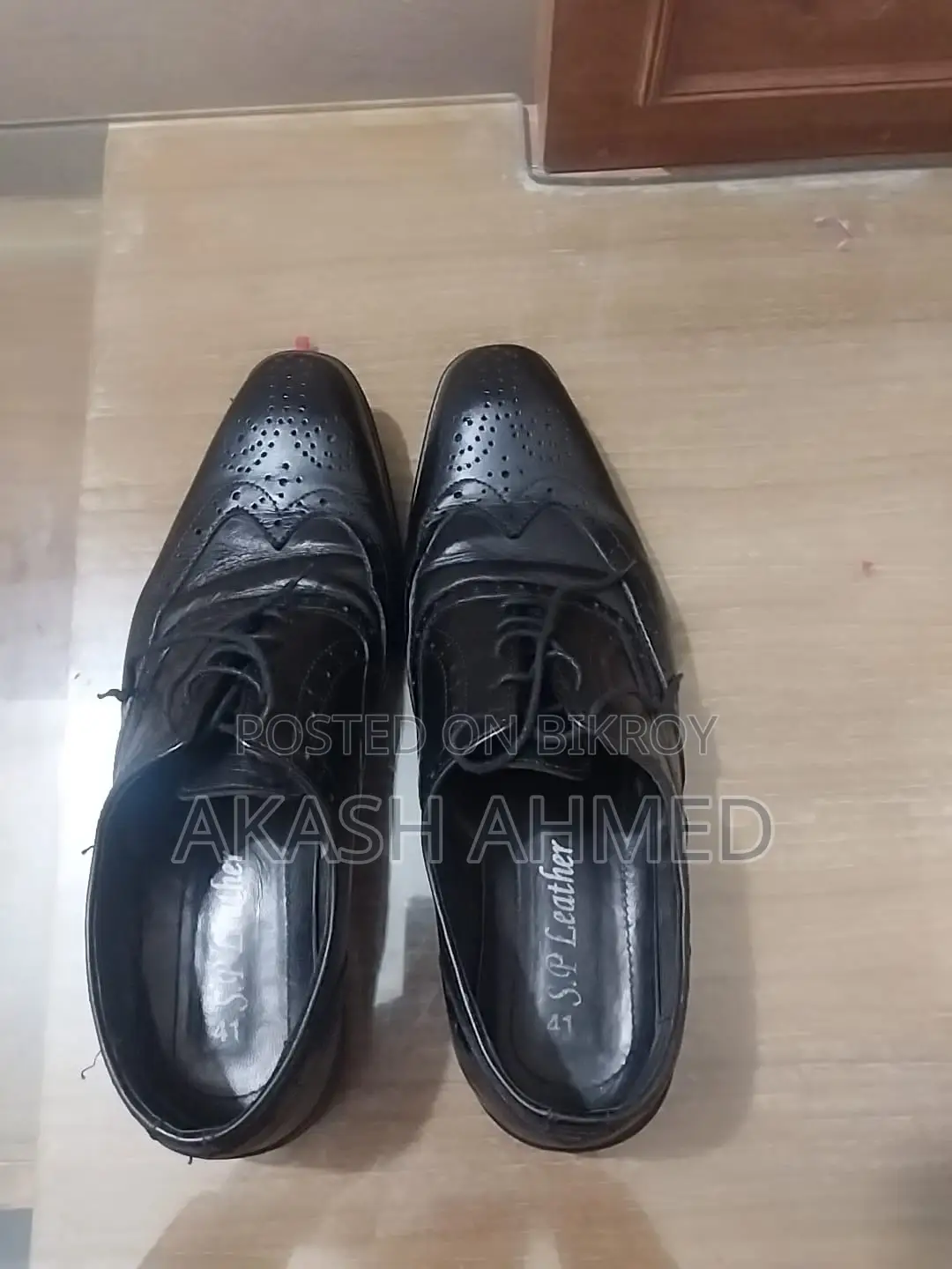 A pair of almost new original leather shoes for sale
