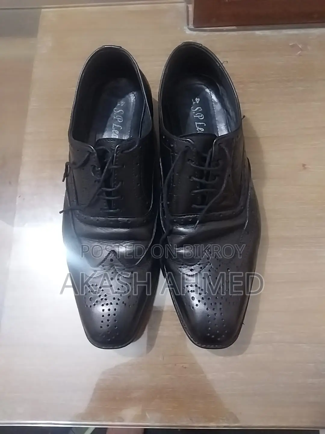 A pair of almost new original leather shoes for sale