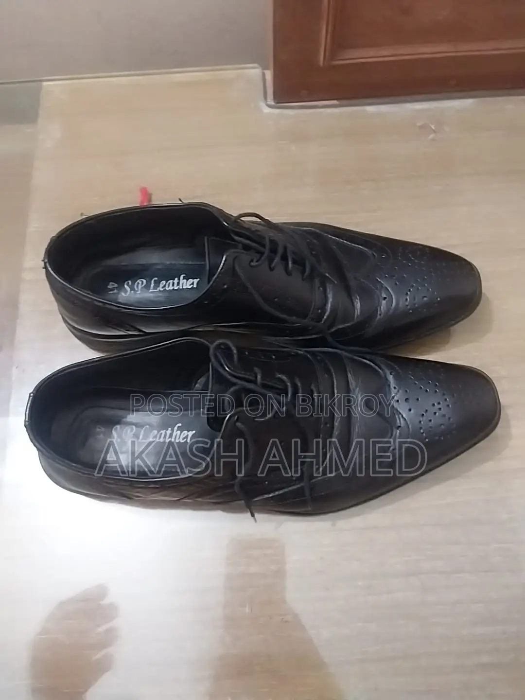 A pair of almost new original leather shoes for sale