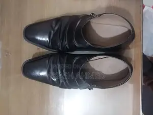 Pair of original leather shoes for sale.