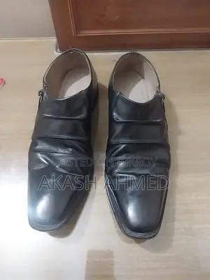 Pair of original leather shoes for sale.