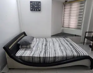 2 Chinese PU Leather Covered Bed with Mattress. Used.
