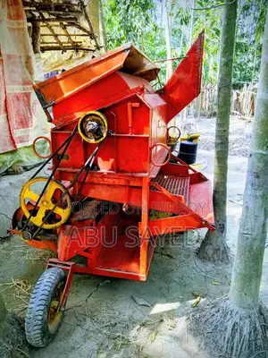 ধান মারাই মেশিন