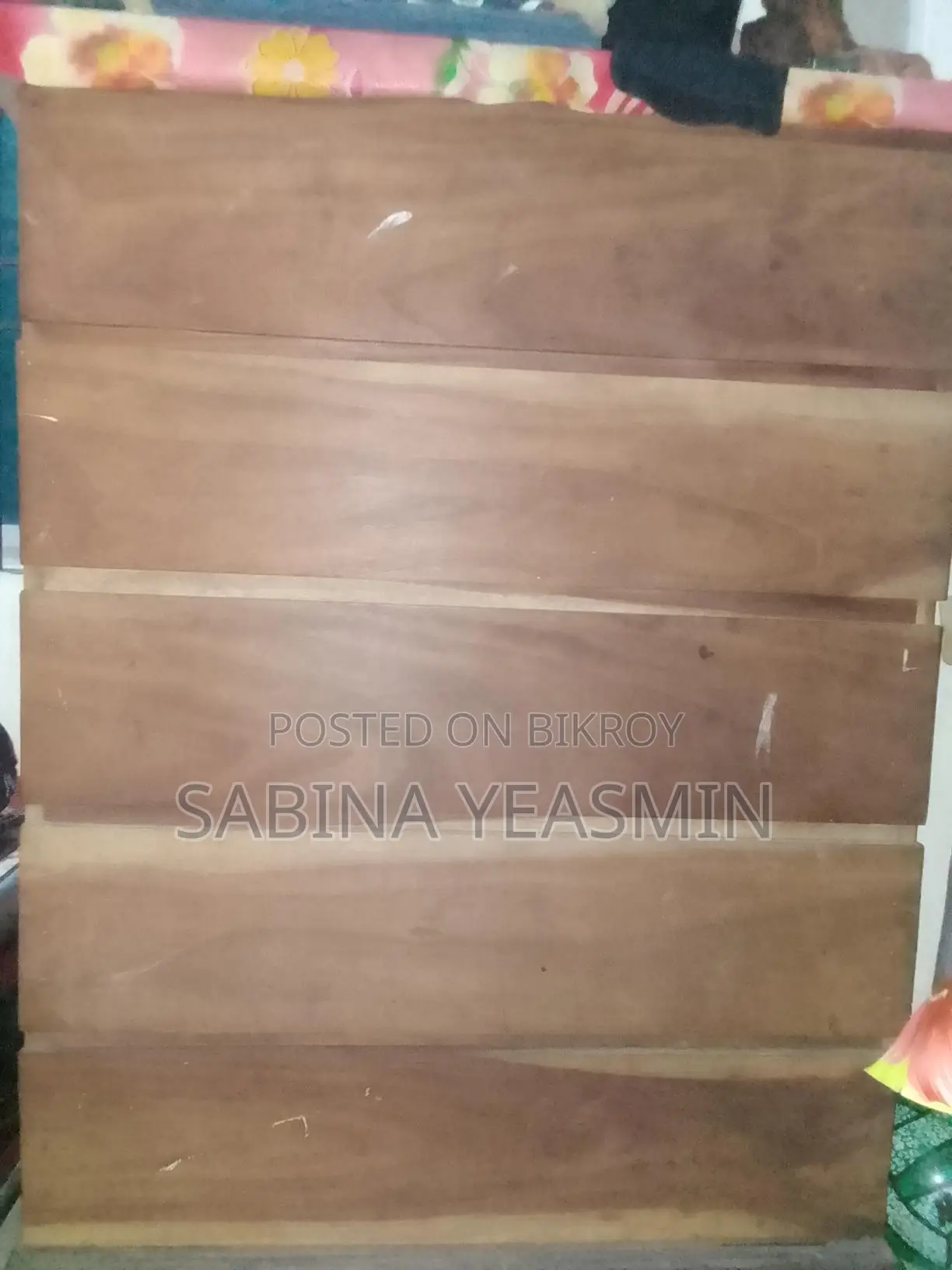 Selling a teak wood wardrobe without polish.