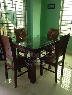 ডায়নিং টেবিল ও চার টা চেয়ার