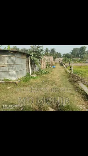 Land with tin-shed house for sale