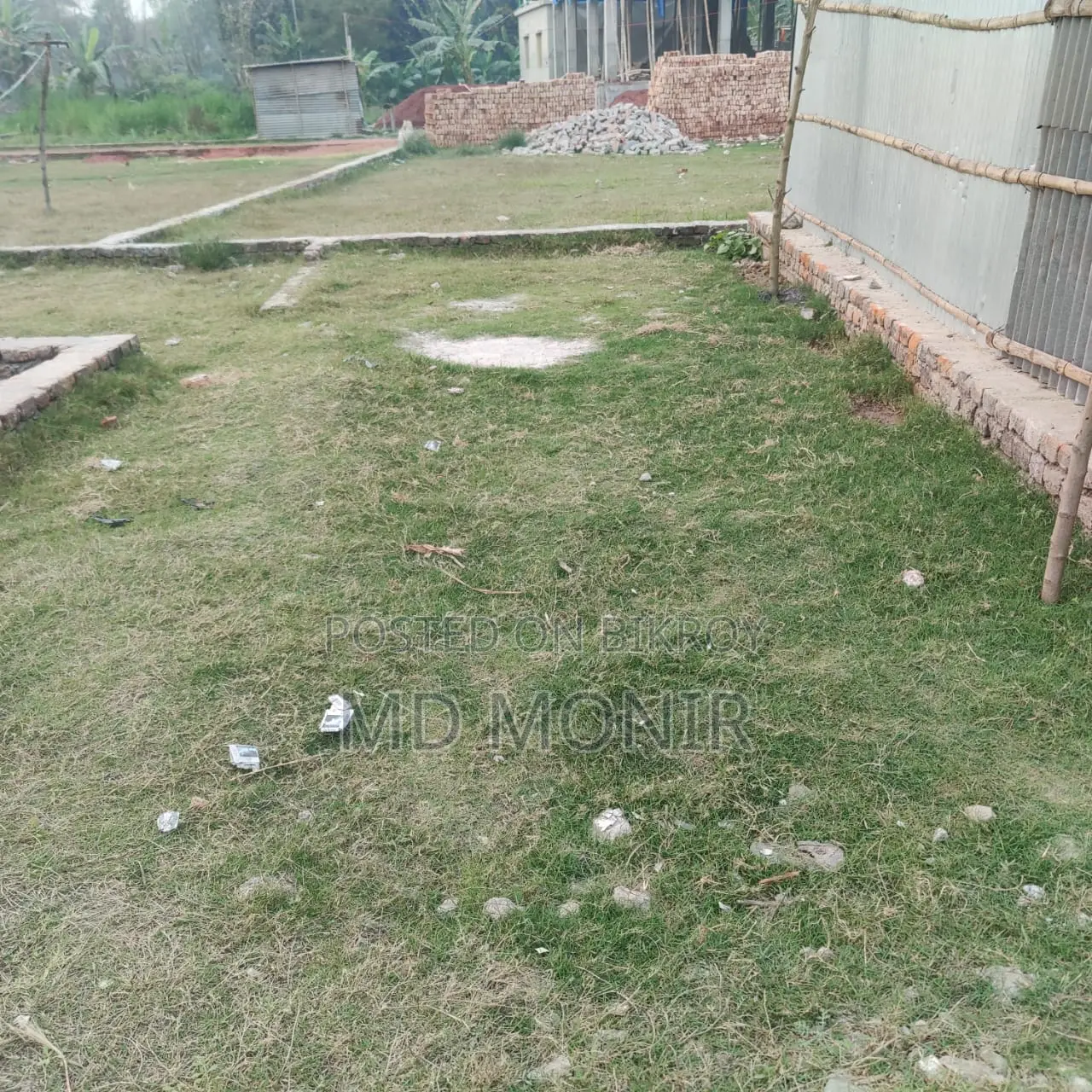 Land with tin-shed house for sale