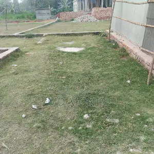 Land with tin-shed house for sale