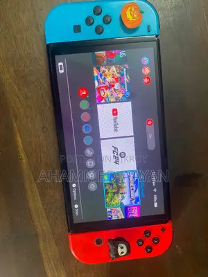 Nintendo Switch Oled + 5 Game Included