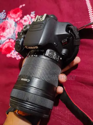 Canon Kiss X7i Camera with 18-135mm lens for sale.