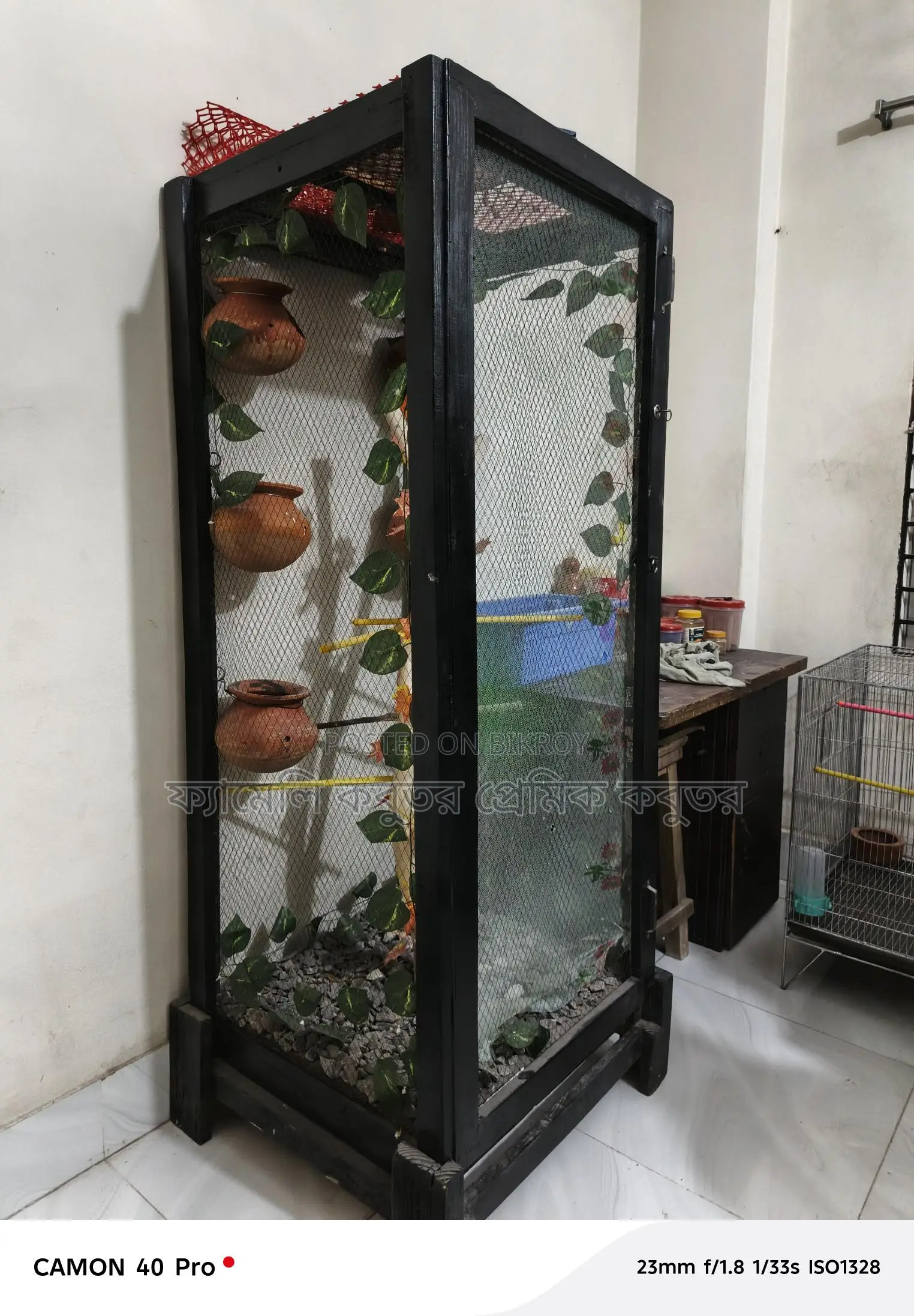 The cage is 5 feet 7 inches long
