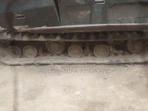 ধান কাটার কবুতা হারভেস্টার মেশিন।
