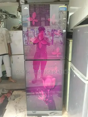 A like-new 341 Liter Walton refrigerator with 6 years official warranty.