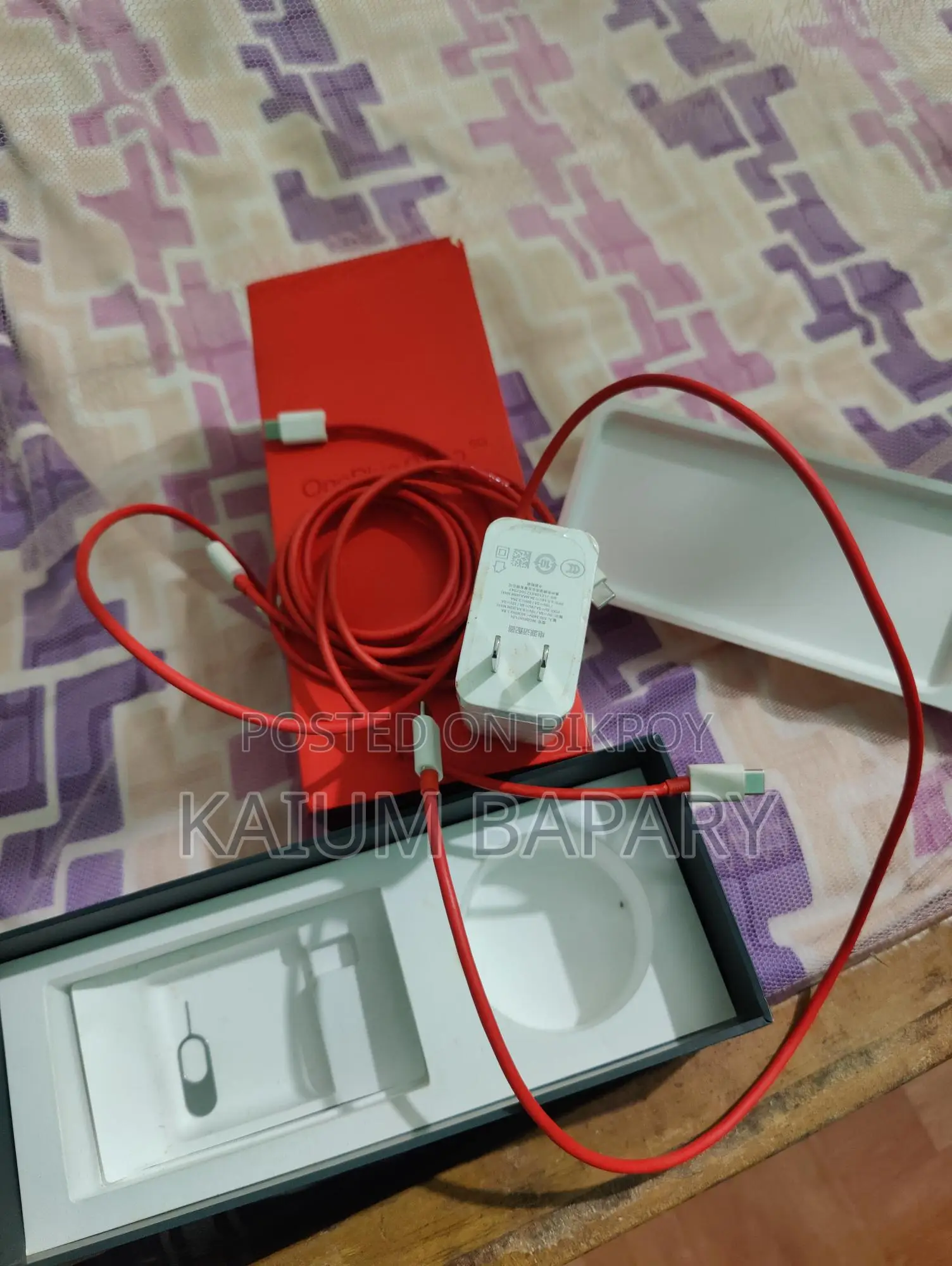 Oneplus 9 চার্জার ব্যবহৃত