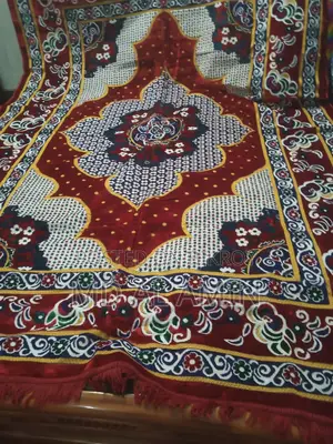 মেঝেতে বিছানো গালিচা