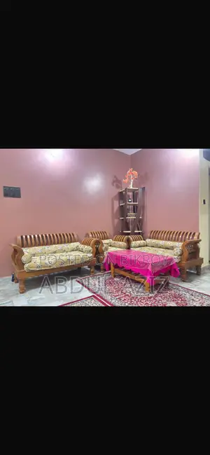 5-Year-Old Teak Wood Sofa Set for Sale. Includes Center Table